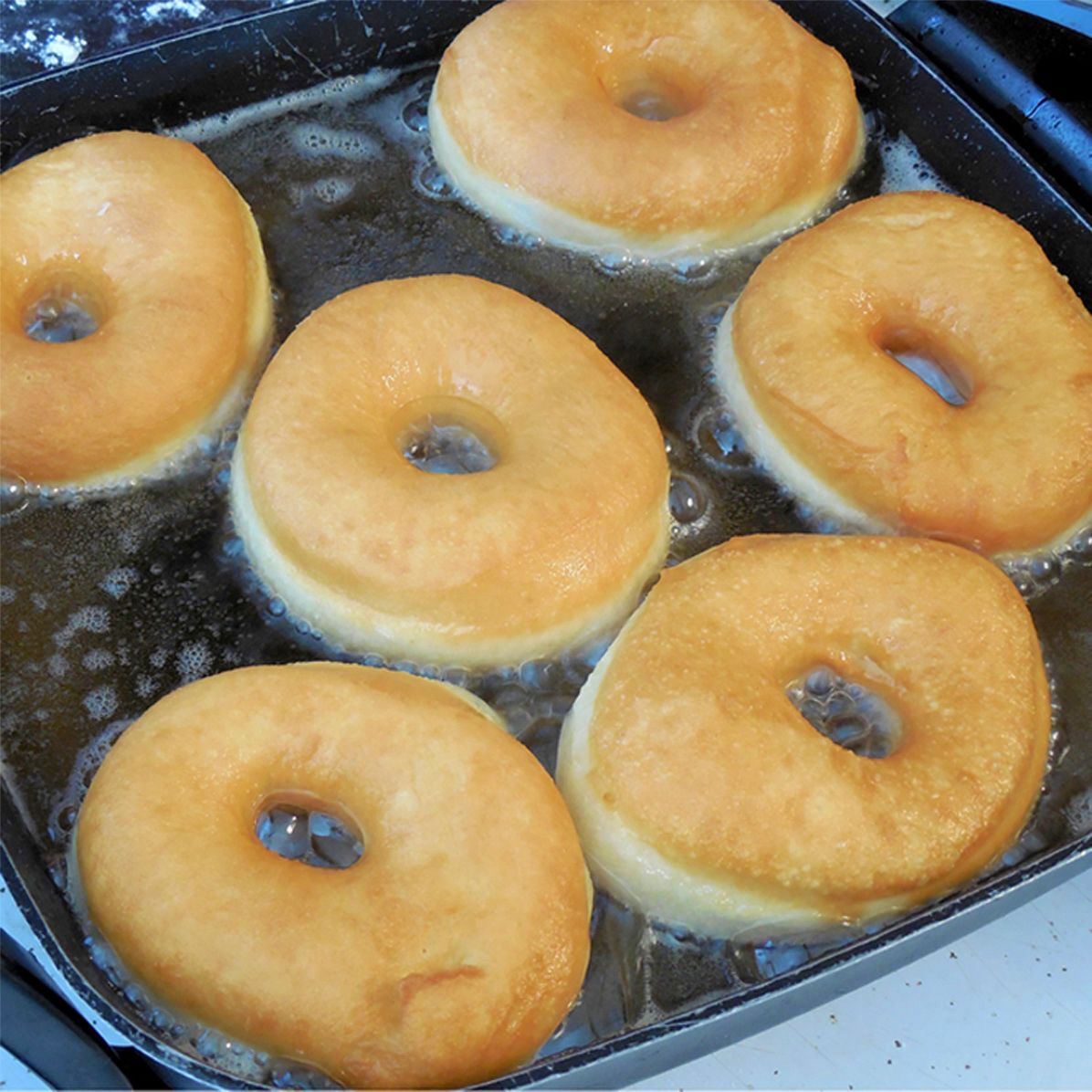 Fry until golden-colored; flip.